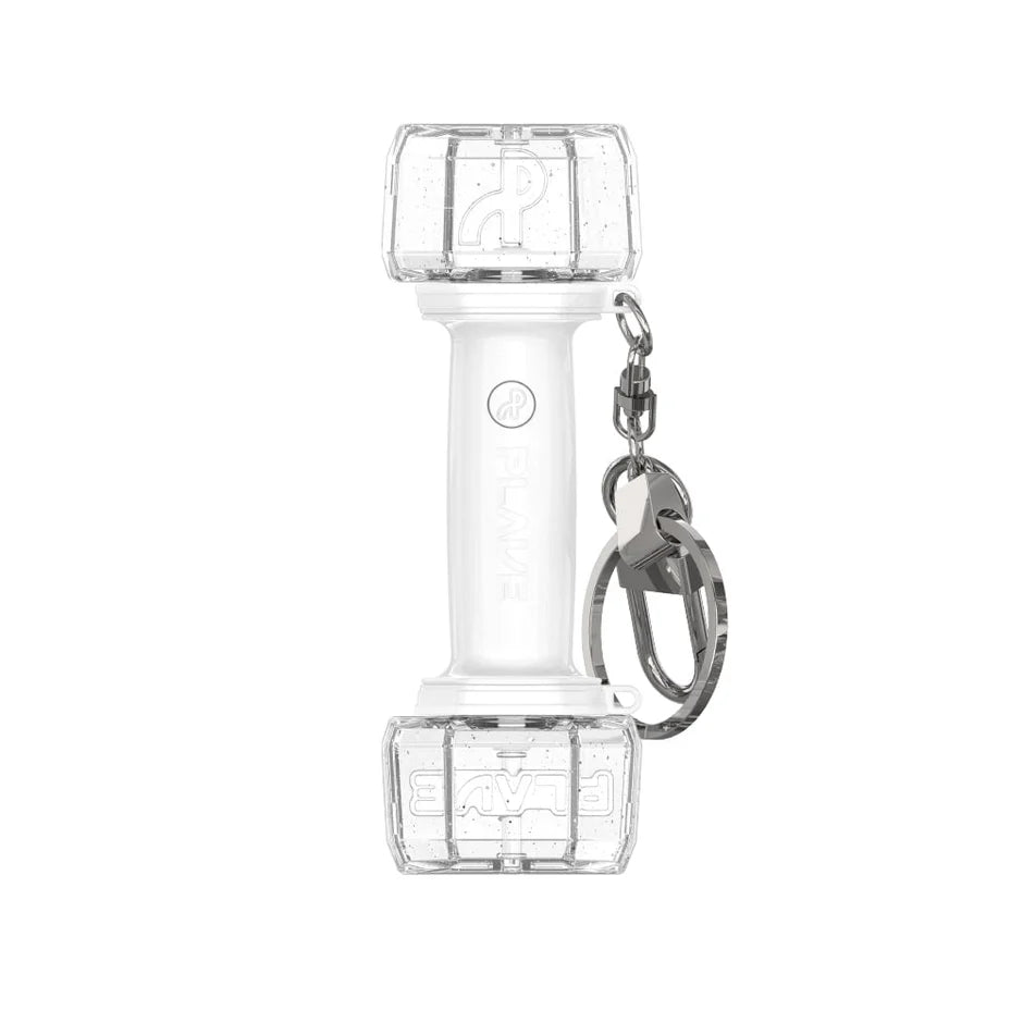 PLAVE's clear plastic keychain with a heart-shaped ring on a white background