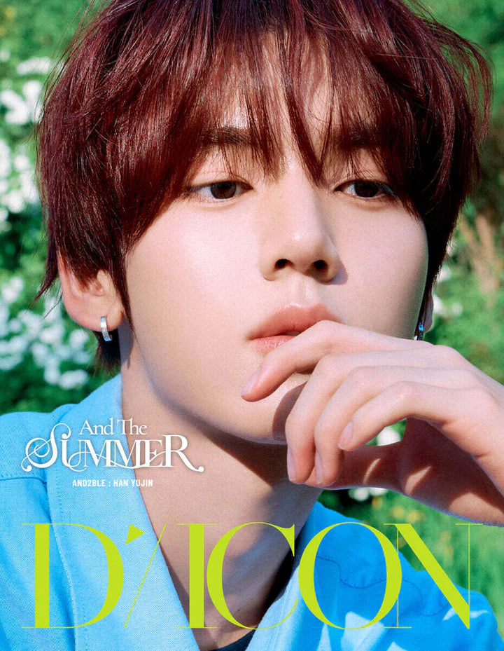 A close-up portrait of a young man with reddish-brown hair wearing a bright blue shirt, with large yellow text reading 'D'ICON' and white text reading 'And The Summer AND2BLE HAN YUJIN' over the lower portion. The background is softly blurred green foliage.