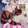 TWS's Jihoon wearing a striped hoodie sitting in front of shelves with snacks, with 'D'ICON' branding.