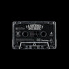 Clear cassette tape with Bill Stax's  'Live Fast Die Skat' label on a black background