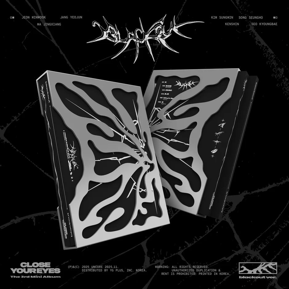 Black and white butterfly-shaped cover of CLOSE YOUR EYES's 3rd mini album with intricate designs on a black background