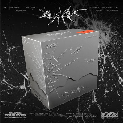 Gray box of CLOSE YOUR EYES's 3rd mini album with spider web design on a black marble background