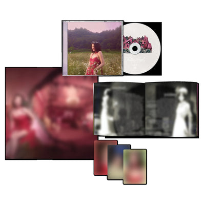 BLACKPINK JENNIE's EP music album package layout on a black background, including a CD with a pink-toned cover, an open photo booklet with portrait pages, a large portrait print, and three photocards