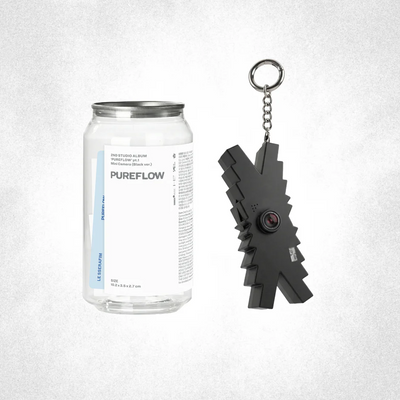 LE SSERAFIM's 2nd studio album packaging with a transparent bottle with the text 'PUREFLOW' written on it and a black camera in the form of their logo on a white background