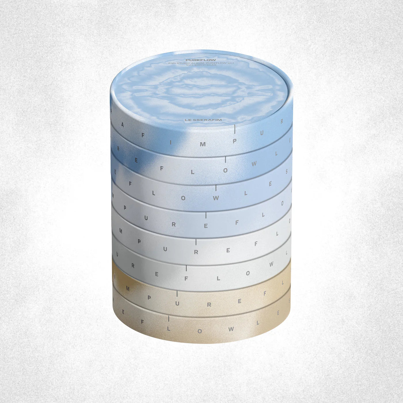 LE SSERAFIM's standard version - stack of cylindrical containers with gradient design and 'PURE FLOW' text on a light gray background