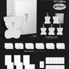 Product inclusions of MEOVV's 2nd ep with a plush toy and card set on a black background