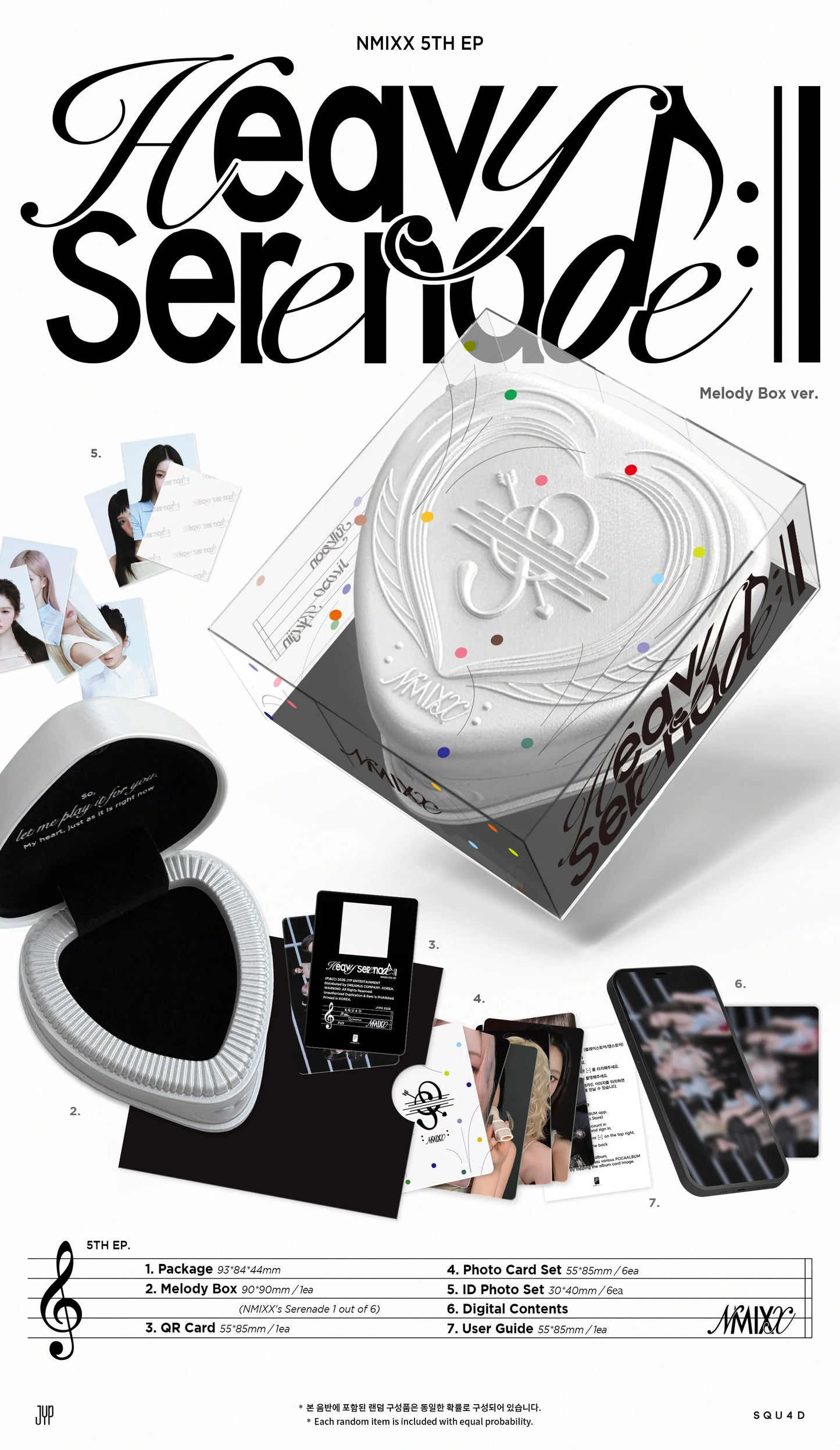 NMIXX's album with 'Heavy Serenade' branding and inclusions of various items including a photo card set and a gift card.