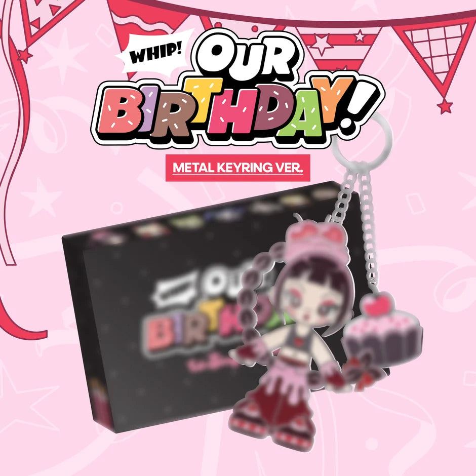 A metal keyring charm featuring a cartoon girl in a pink birthday dress holding a cupcake, shown in front of a black box with the text 'OUR BIRTHDAY! METAL KEYRING VER.' on a pink decorated background.