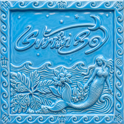 RED VELVET's album cover with a mermaid and text against a blue background