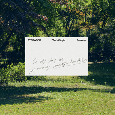 Promotional photo of RyeoWook's 1st single album with a white sheet with text written on it and a forest setting as the backdrop