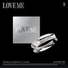 Silver ring with 'LOVEME' engraving and a matching card on a black background for SHOWNU & HYUNGWON's album