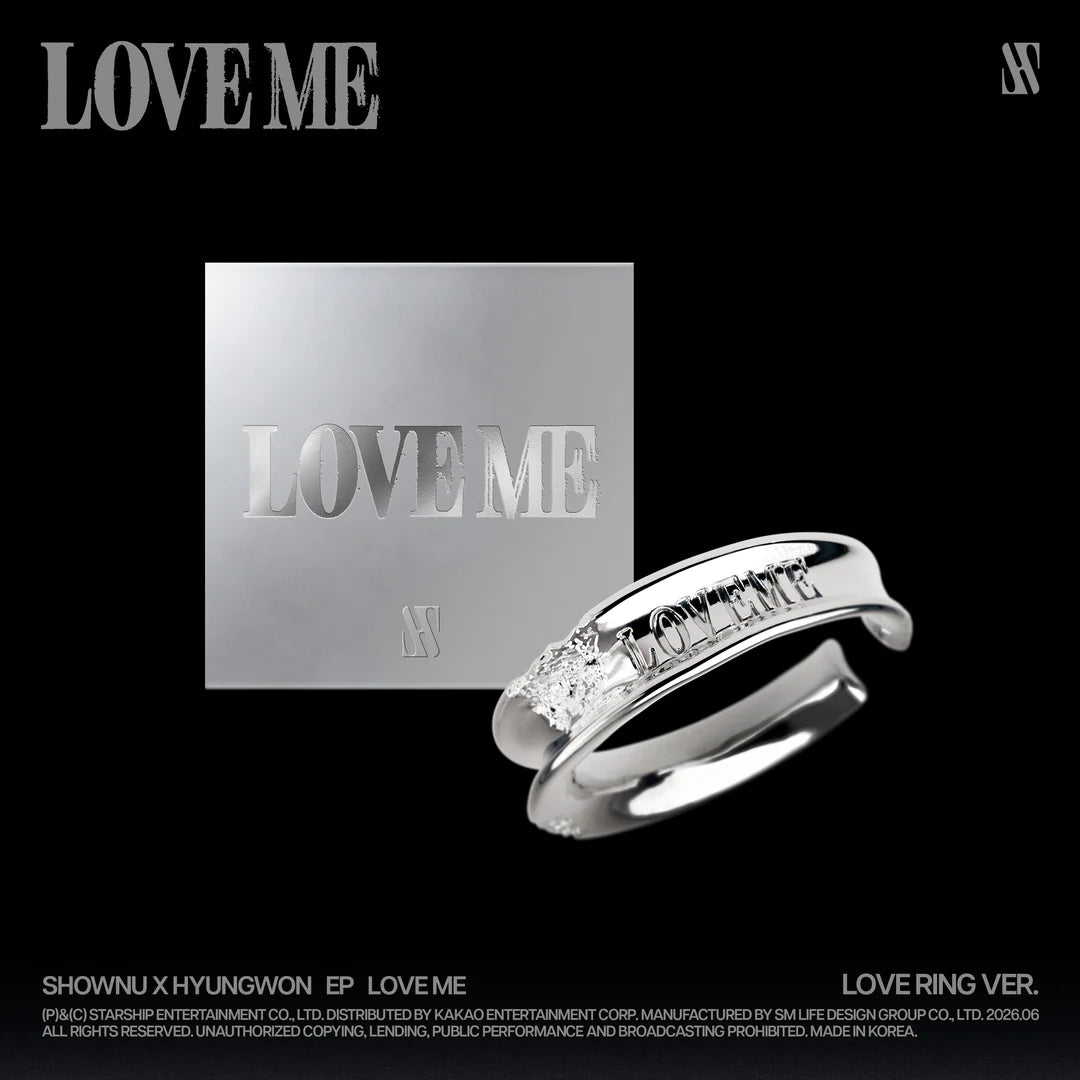 Silver ring with 'LOVEME' engraving and a matching card on a black background for SHOWNU & HYUNGWON's album