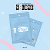 STAYC '2: LOVE' album packaging on a light blue background