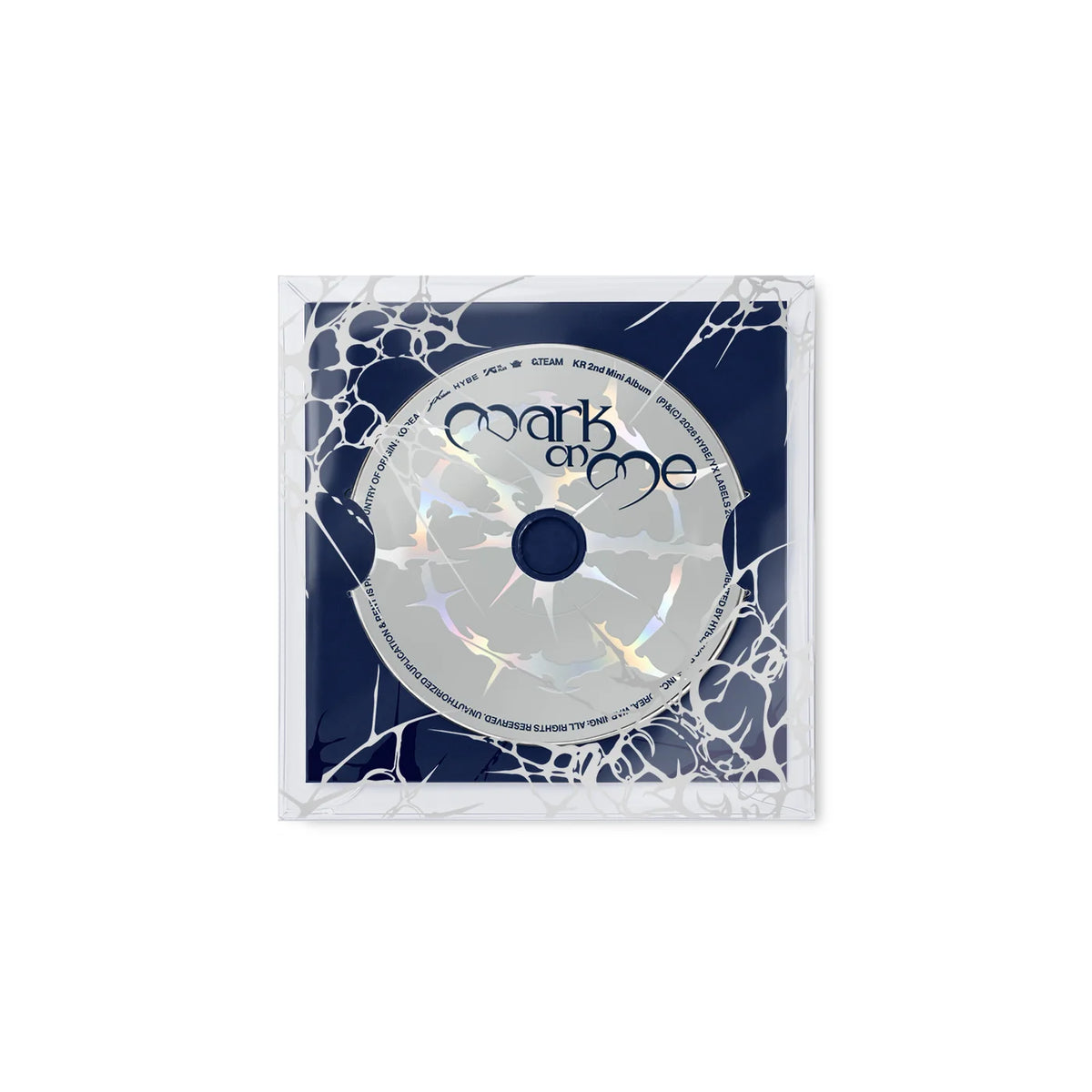 A silver holographic CD with 'mark on me' printed on it, set inside a clear square case with a dark navy insert and white cracked-glass style graphics, isolated on a white background for &TEAM's KR 2nd mini album