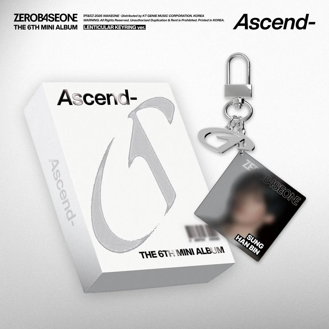 ZEROBASEONE's album packaging with keychain and card featuring 'Ascend-' branding on a white background