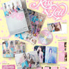 aespa's Kiss N Tell Limited Edition album inclusions featuring a CD, a photobook, a poster, and photocards on a pale yellow background with pink stars.