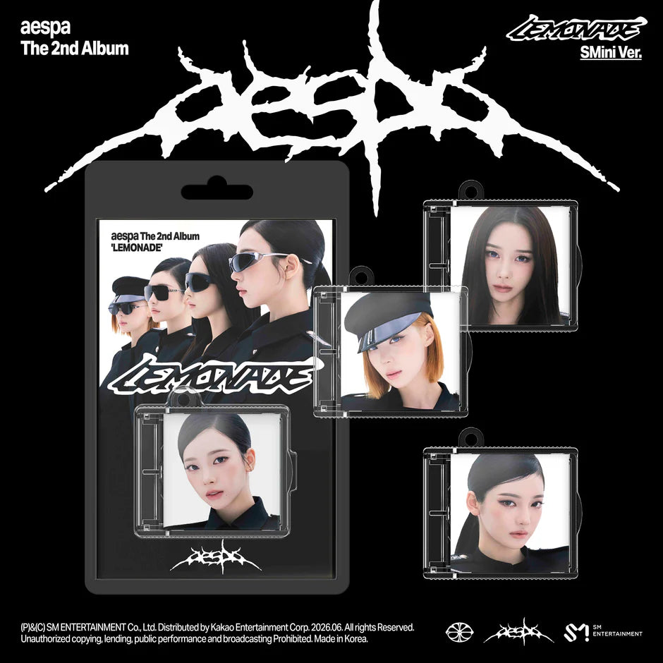 aespa album packaging with individual member versions on a black background
